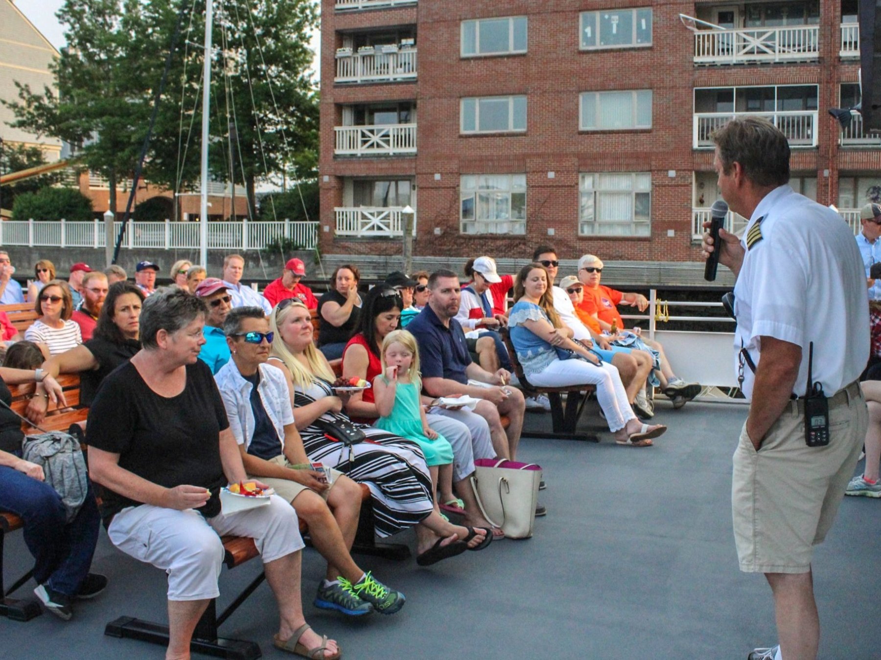 a group of people sitting on a bench