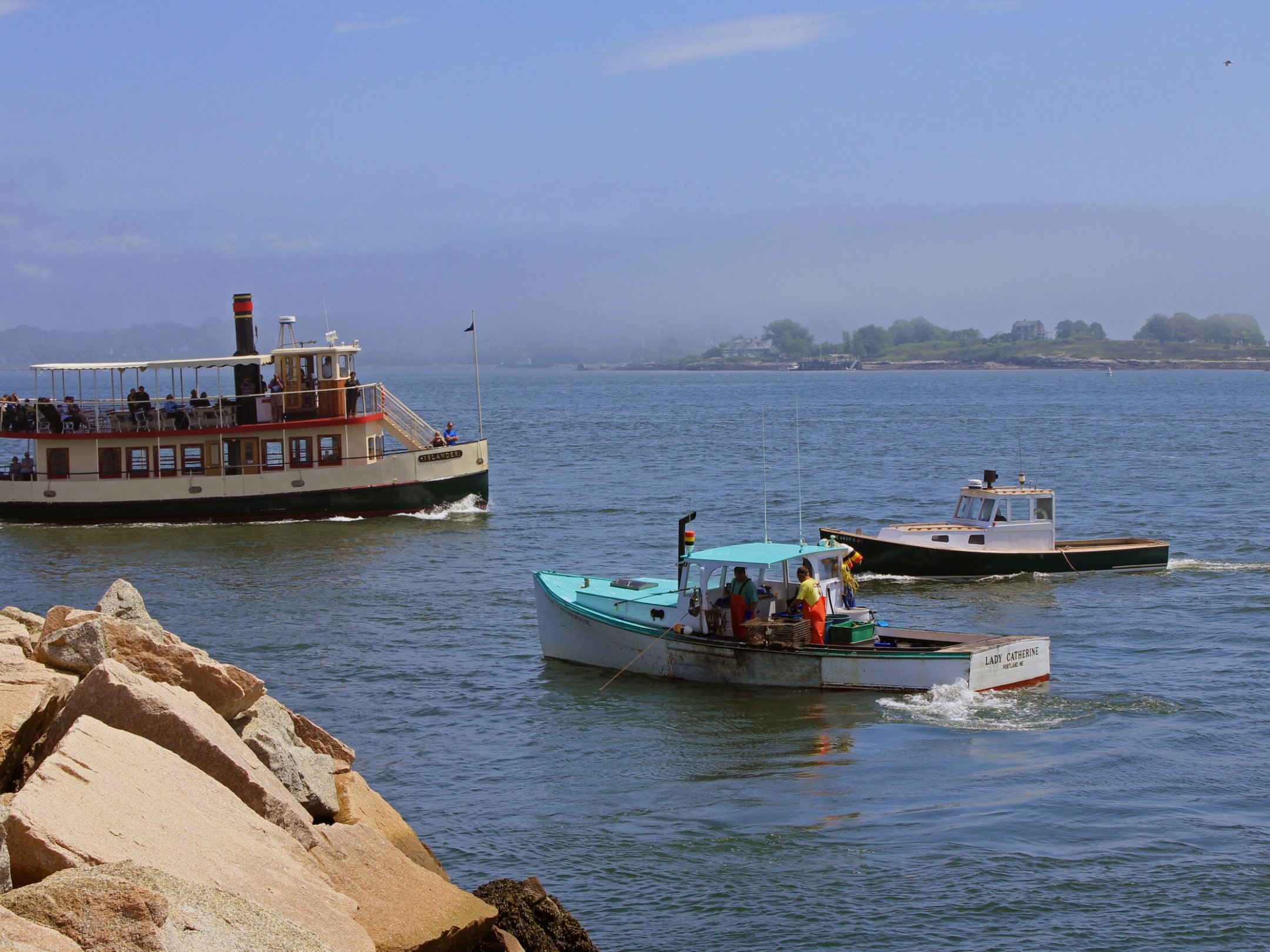 a small boat in a large body of water