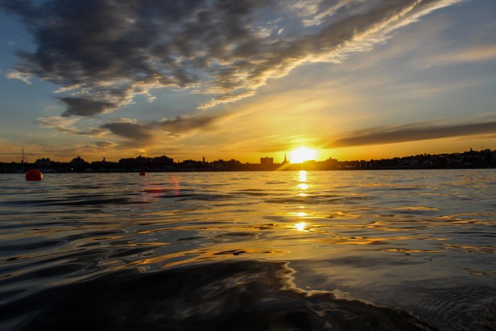 a sunset over a body of water