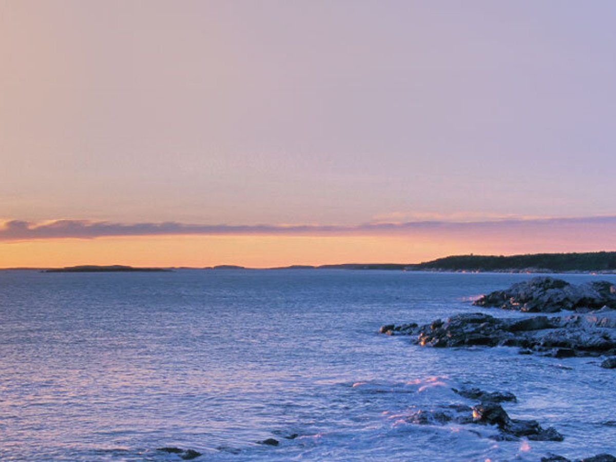 a large body of water next to the ocean