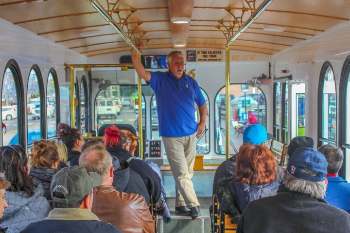 a group of people standing in front of a store