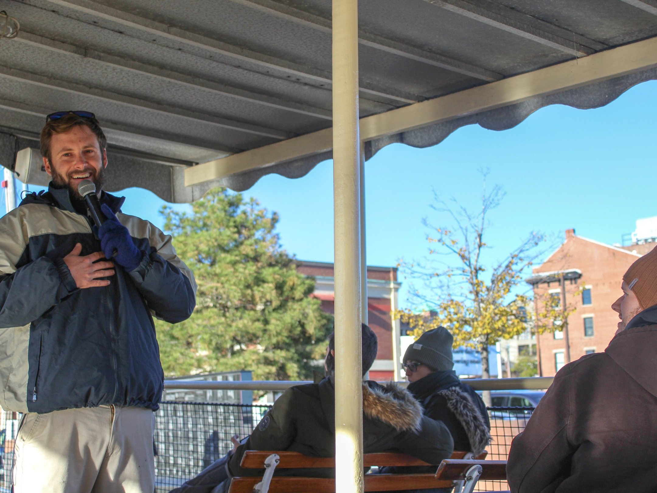 a man standing in front of a building