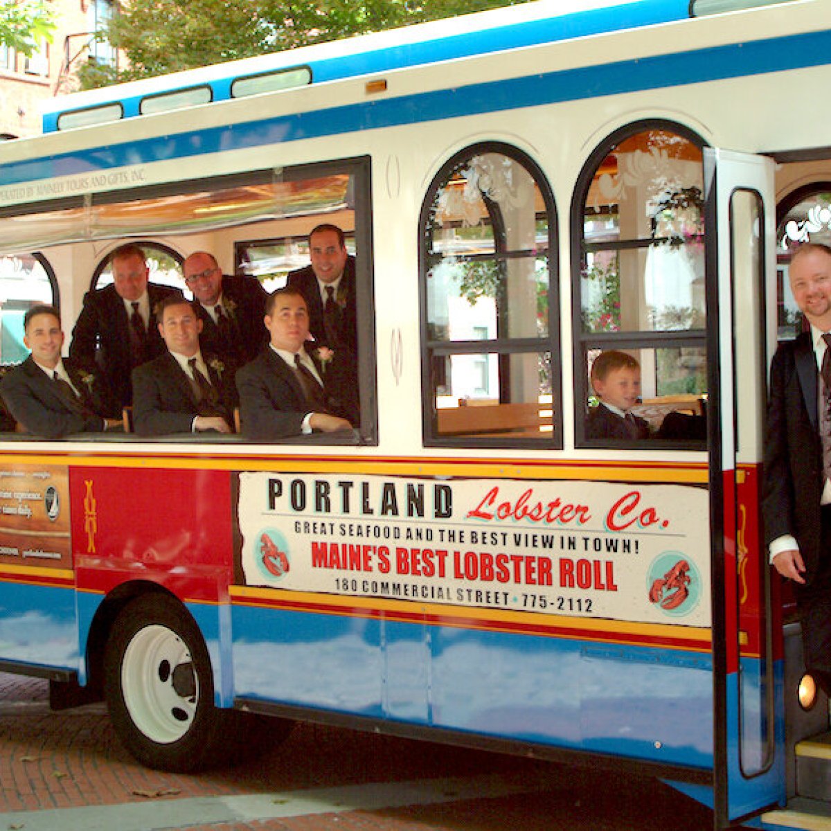 a person standing in front of a bus