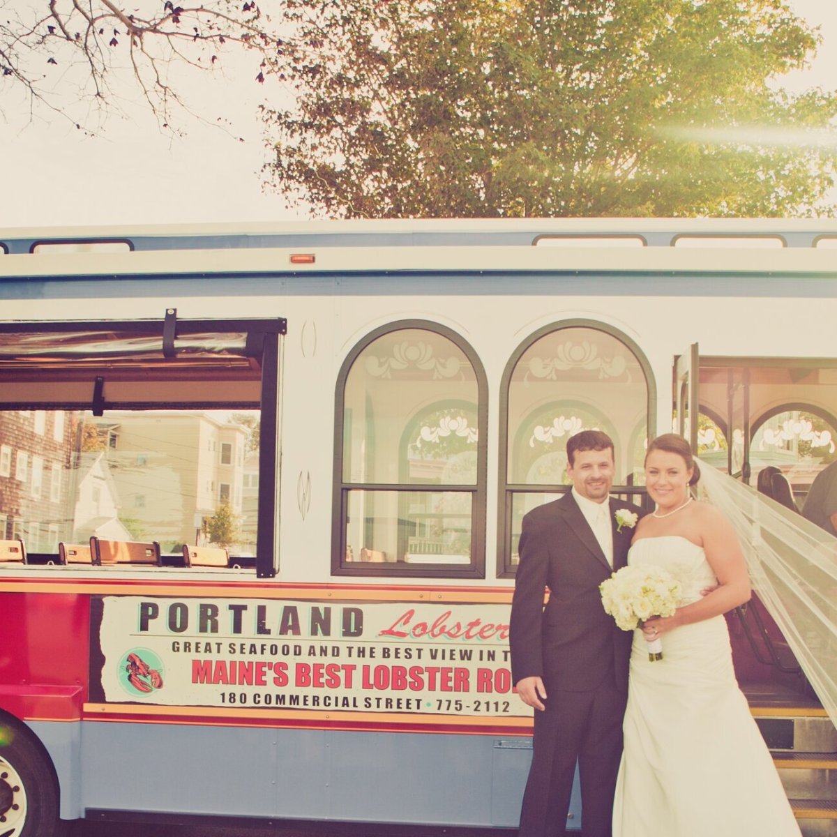 a man standing in front of a truck