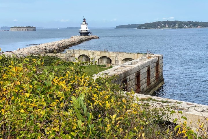 a stone bridge over a body of water